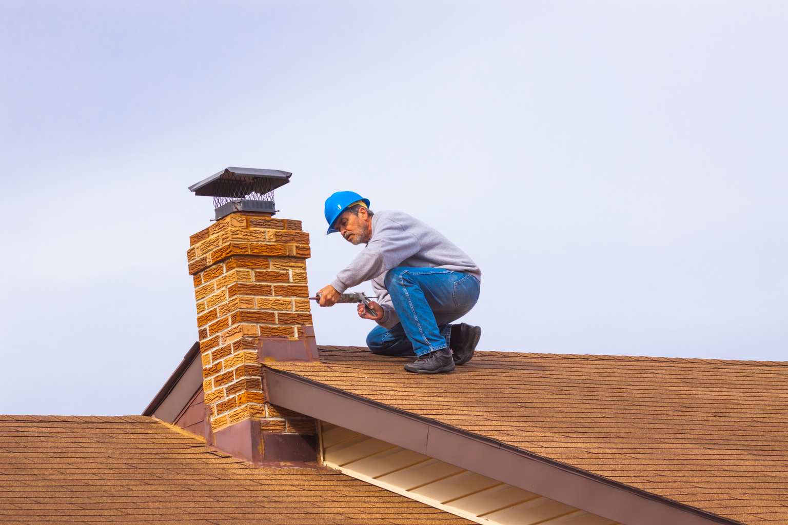 Nottingham Chimney Sweeps contractor on roof